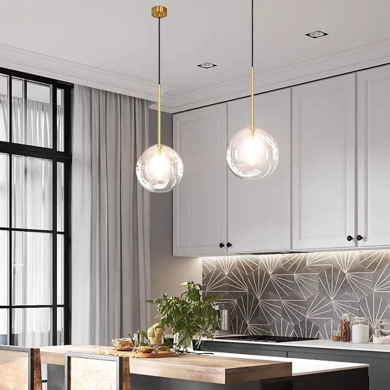 Lustre en verre transparent - Xana Lustre en verre transparent - Xana : Illuminez l'espace