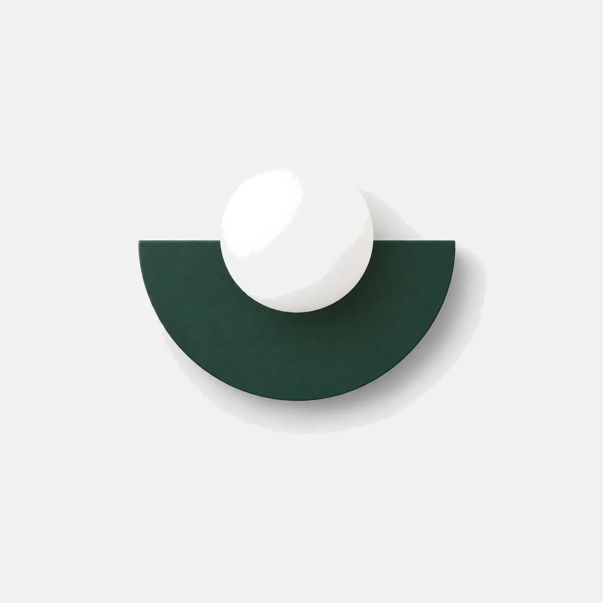 Applique murale boule en verre Polux vert foncé, globe opalin sur demi-disque, sur fond uni