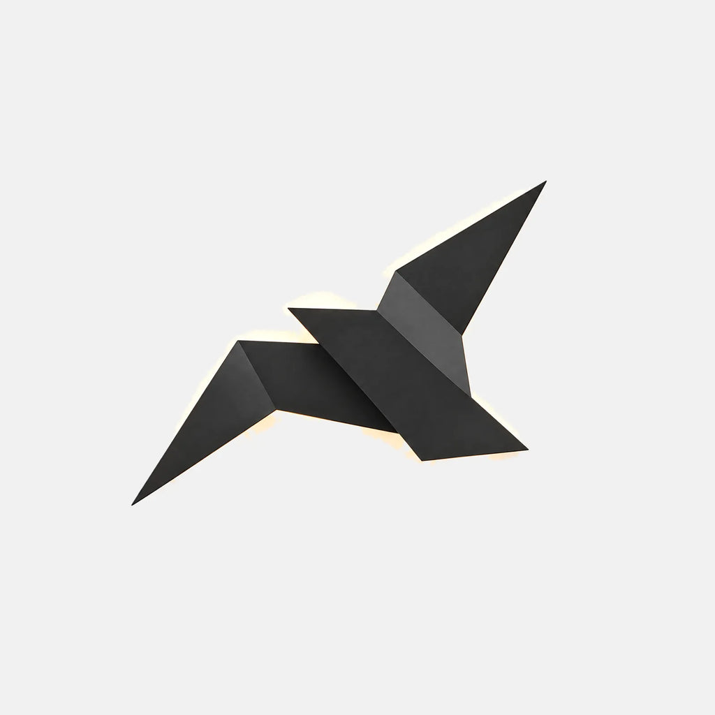 Applique murale oiseau Volaris noire en métal plié, sur fond uni