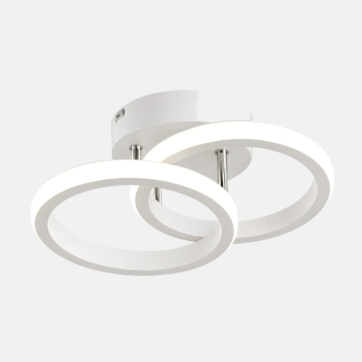 Plafonnier LED Zola blanc à double anneau, sur fond uni