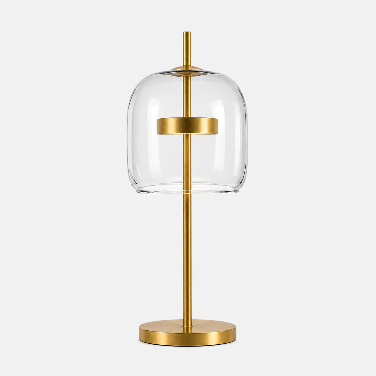 Lampe de table en verre Lumio, verre transparent et pied en laiton, sur fond uni