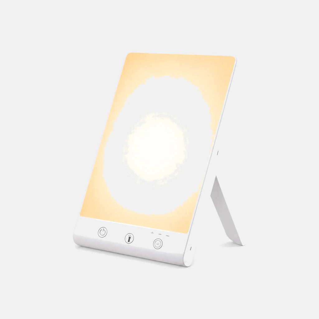Lampe de luminothérapie LED Lumo, panneau blanc lumineux sur pied, sur fond uni