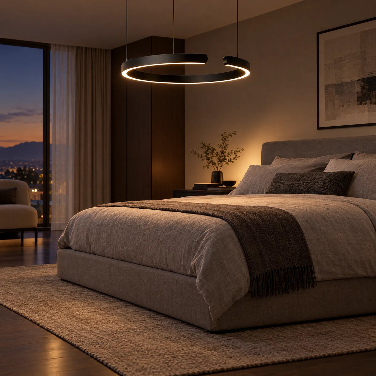 Suspension anneau LED Iva noire allumée dans une chambre Image