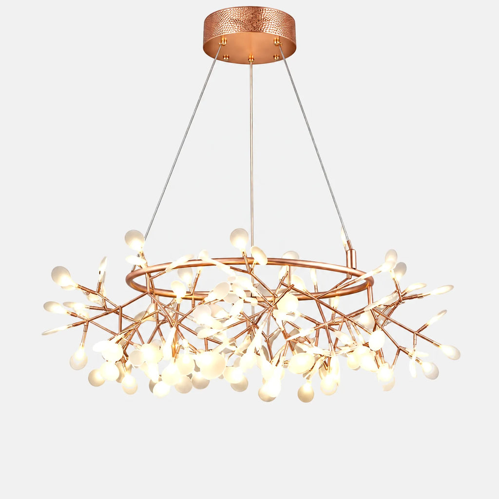 Suspension luciole Luka, anneau or rose et branches à LED, sur fond uni